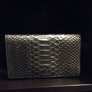 Coach retail metalic snake skin crossbody cluth